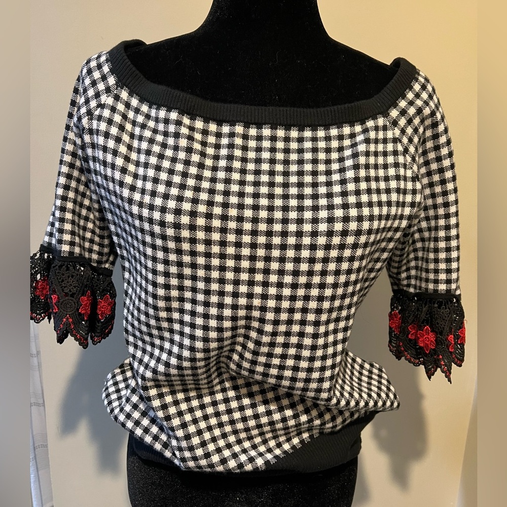 Black and white checkered off shoulder sweater